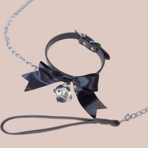 Shown is the black satin soft collar with the bell and lead.