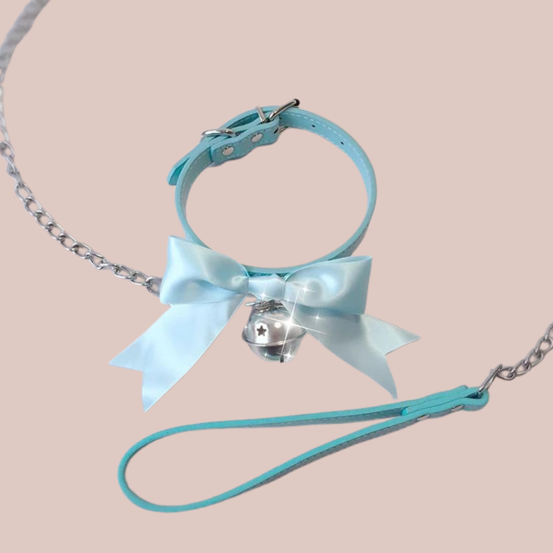 Shown is the blue satin soft collar with the bell and lead.