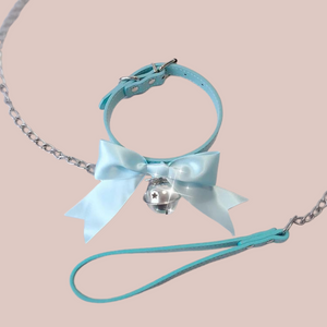 Shown is the blue satin soft collar with the bell and lead.