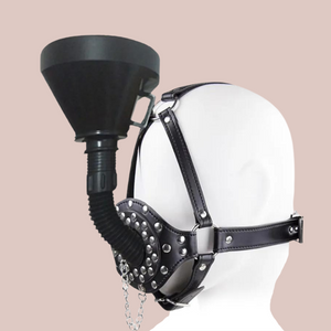 Shown here is the black faux leather studded head gag with removable funnel fixed in place.