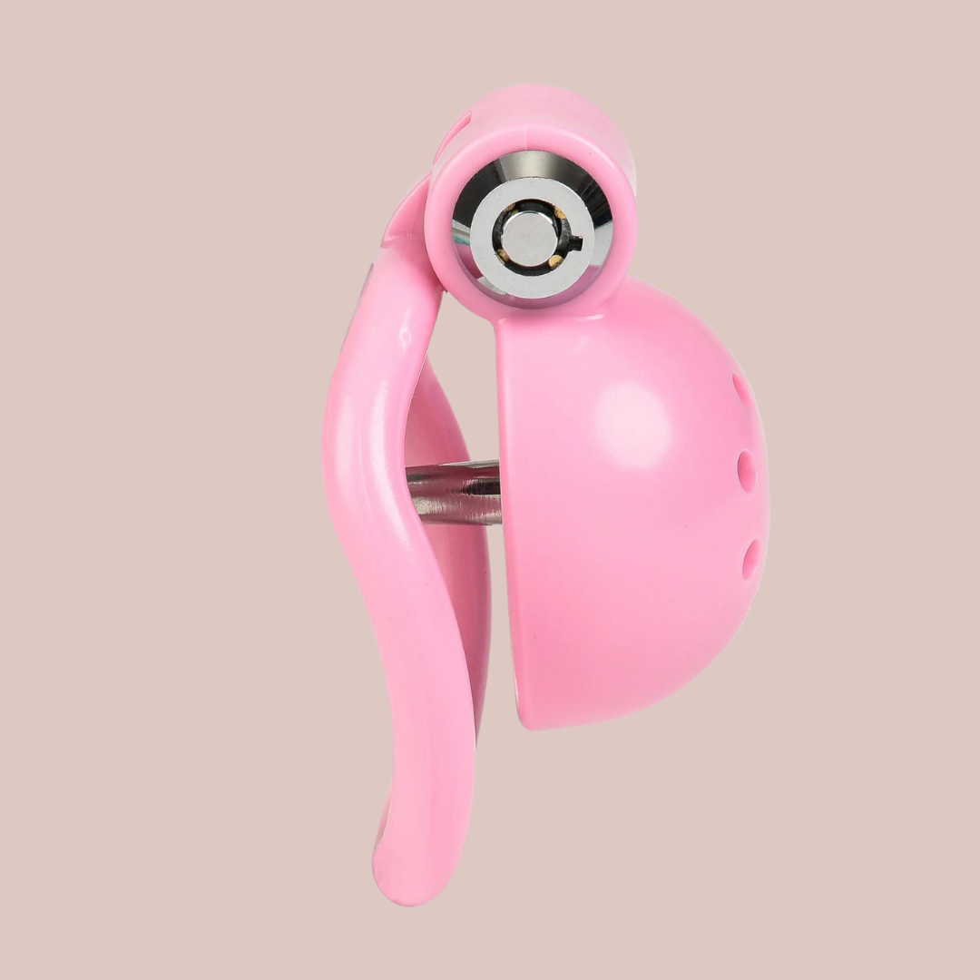 A side view of the The Ultra Urethral Pink push lock, from this angle you can see the curved base ring, urethral tube running through and the side button lock.