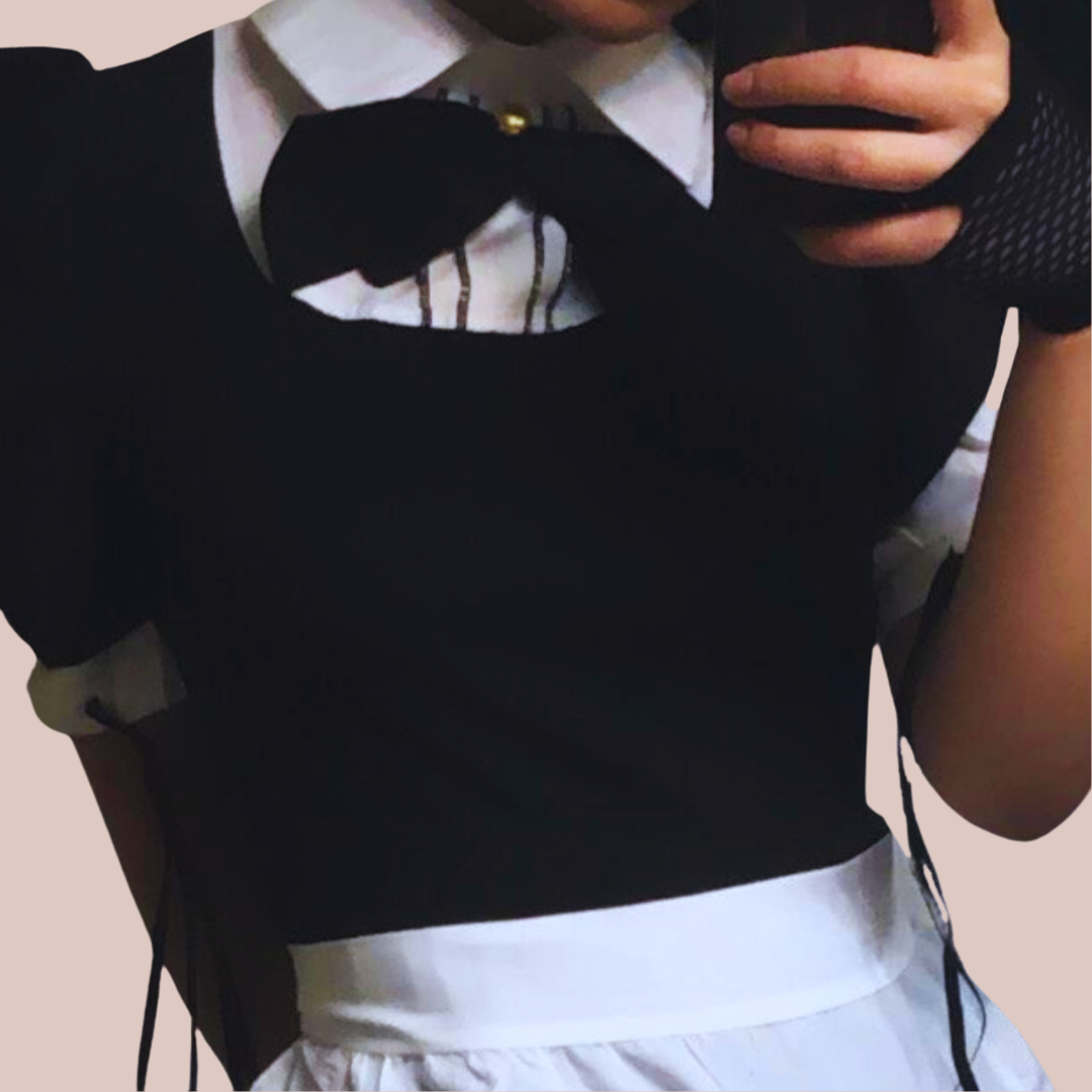 The Amber maid dress in black being modelled.