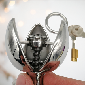 The Blossoming Dilator from House Of Chastity is shown close up, it has been opened to its full extent.