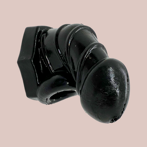 A side view of the Detained Flex silicone chastity cage from House Of Chastity