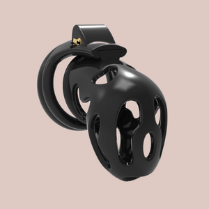 Design 2 of the Ghost Chastity Device, you can see the straight cage with the drop end from a front angled view, fitted to the base ring and the integral lock is in place.
