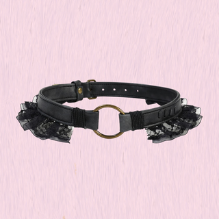 the neck collar with lace edging on a pink background