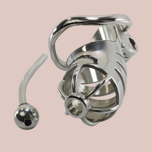 An alternate view of the JJ cock cage, it is shown with its base ring attached but the urethral tube removed. This chastity cage can be found at House Of Chastity.