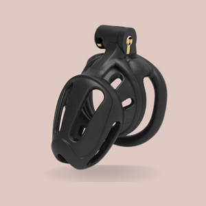 An angled view of The Kidding Zone 3D in black, you can see it fully assembled and with the integral lock in place. This chastity cage is fitted with a flat base ring.