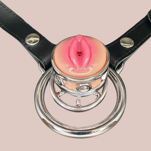 An alternate view of The Pussy Ring chastity cage, this angle gives a clear view of the barbed ring in place.