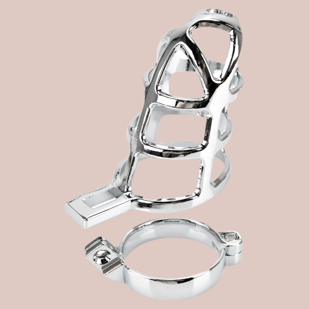 Shown with the base separated and no lock in place, Made from zinc alloy this chastity cage has a very bright silver look to it, the design to the cage is very web like, hence the name.
