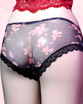 The rear view of The Camellia Gaff tucking panties, the see through material has a flower patter running through it.