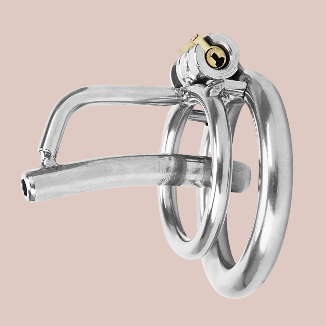 The Clink chastity cage with fixed urethral tube is shown from a side view. You can see the base ring and integral lock are fixed in place.