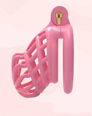 The pink Jurassic Chastity Cage shown from the side, it is shown with the integral lock fixed in place and a flat base ring.