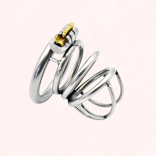 A side view of the fully assembled Lock Up chastity cage on a soft pink background