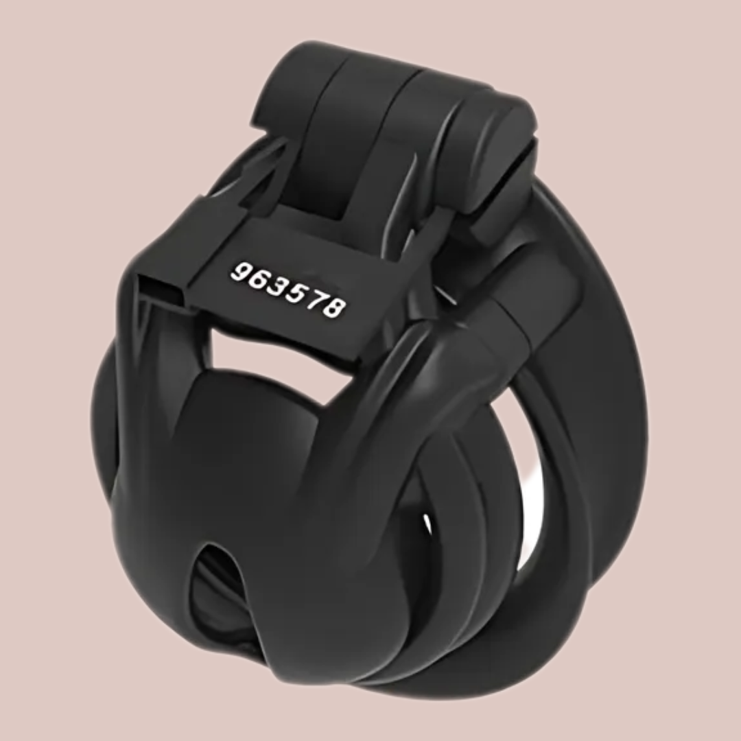 A side view of the Python Nub chastity cage from House Of Chastity, it is fully assembled into its double cuff style base ring and the integral lock is fixed in place.