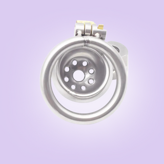 A rear view of The Ultra chastity cage, you can see the holes within the face of the chastity cage, and how the base ring fits onto the cage.