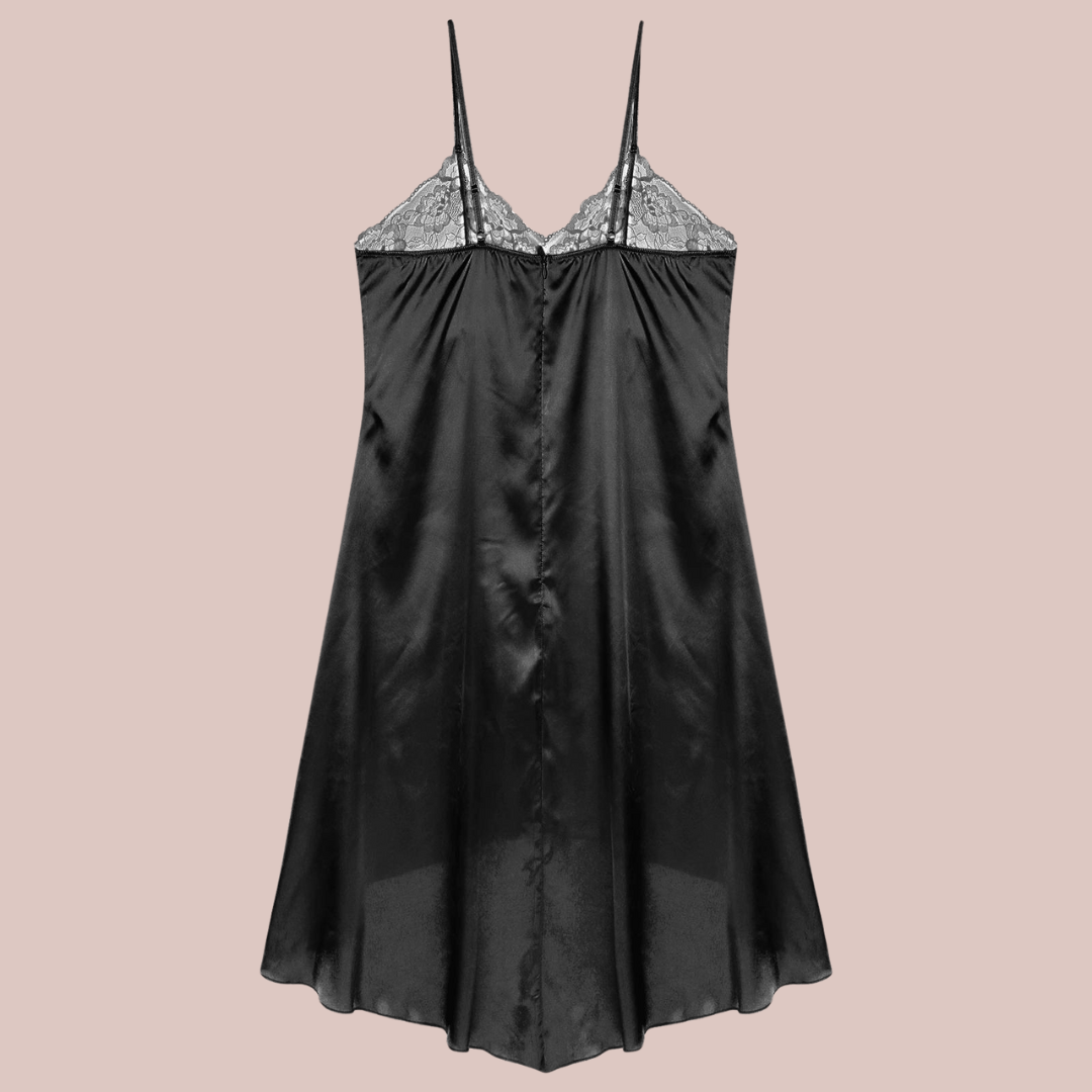 A rear view of the vintage style satin and lace slip, in this image it is lying flat.
