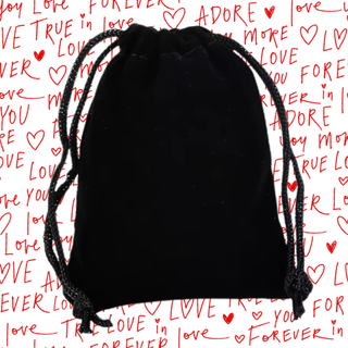 A black velvet style drawstring bag