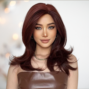 The swept back long length wig modelled for House of Chastity. Fashionable swept back long layered wig in red . Front view
