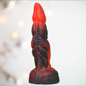 Close up of the Fire Storm Monster Dragon Dildo, close up of the tongue style head, dragon scale body and deep sucker base.
