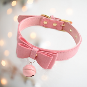 Look as cute as a kitten in House of Chastity's pink kitten bow collar with a cute pink bell.